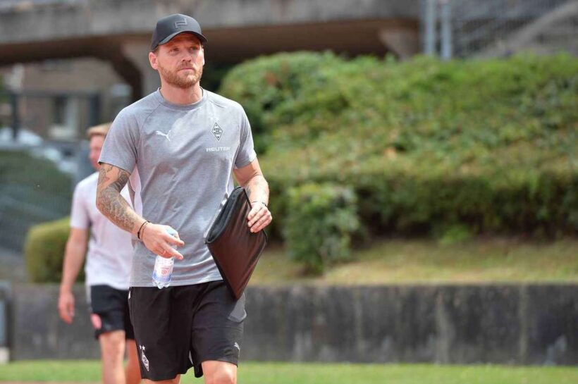 Евген Полански с временным тренером Borussia Moenchengladbach. Он заменил Джерардо Сеоан